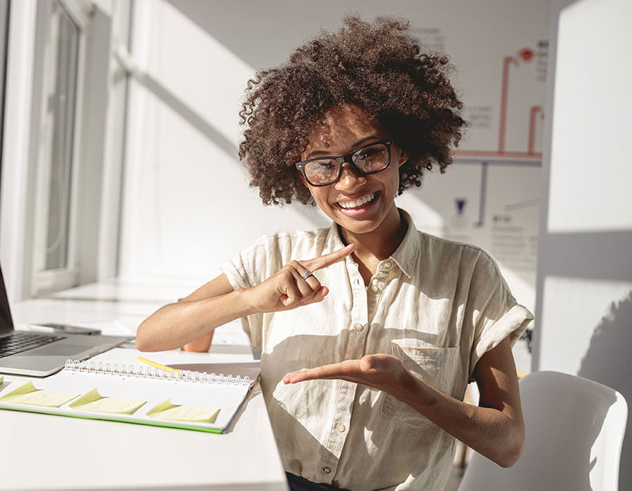 Certified ASL interpreter at a workplace